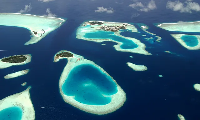 looking down on a number of atolls in the Maldives