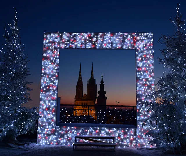 a light arch with Zagreb cathedral in the background